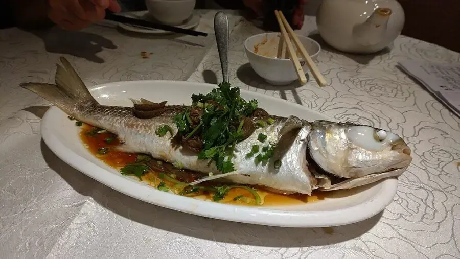 Steamed flathead grey mullet with lemons and soy sauce